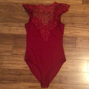 Red lace body suit